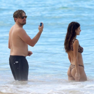 Leonardo DiCaprio took a young girlfriend to an exotic island