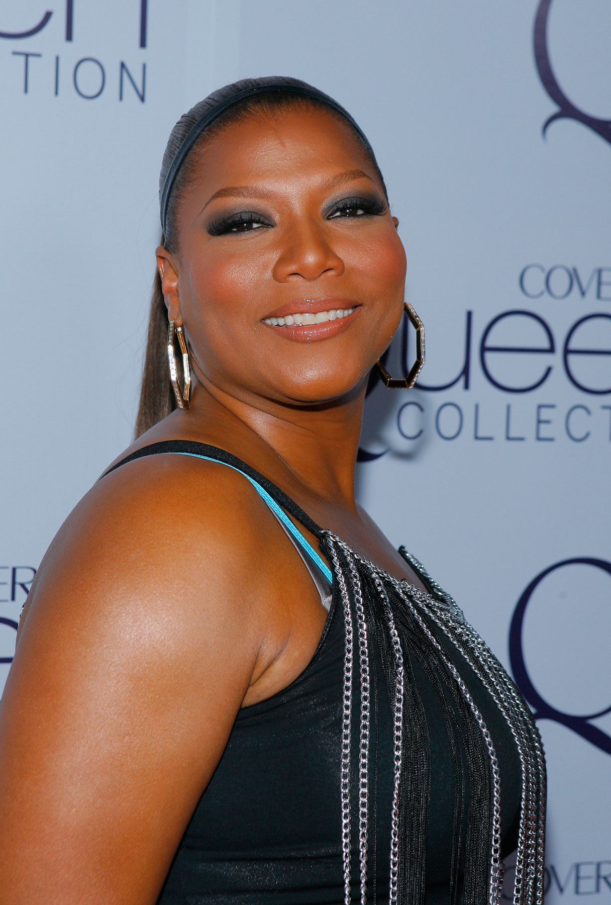 There are 64 more pics in the Queen Latifah photo gallery. 