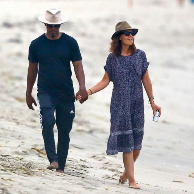 Katie Holmes and Jamie Foxx did not hide feelings at the Grammy party