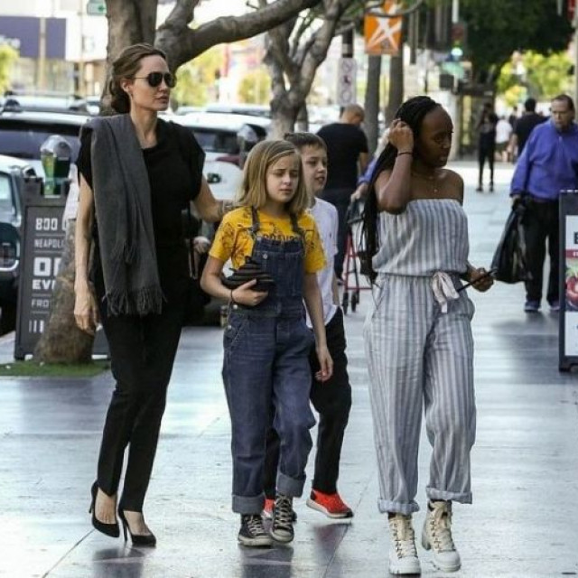 Angelina Jolie going with children to a sushi bar