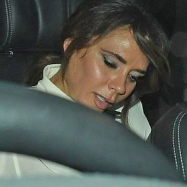 Drunk Victoria Beckham "caught" in the backseat of a car