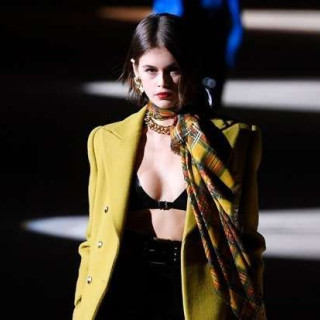 Kaia Gerber wearing a latex bra became the Saint Laurent star show