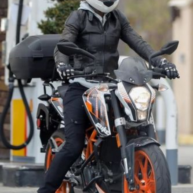 Halle Berry chases Malibu on a motorcycle