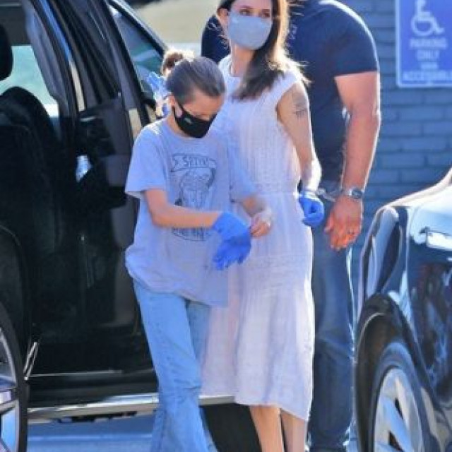 Angelina Jolie in a protective mask went shopping with her daughter