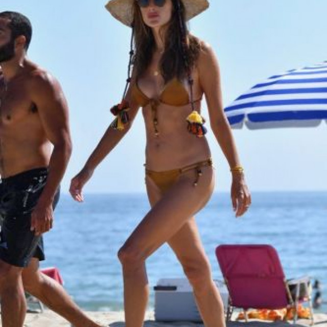 Alessandra Ambrosio showed a figure in a mustard bikini