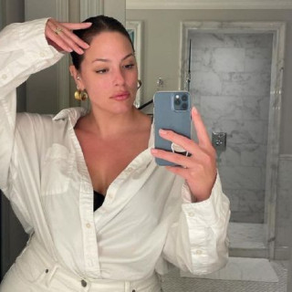 Ashley Graham posed in a racy black bodysuit