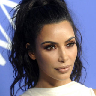 Kim Kardashian's kids are woken up by a pianist every December morning