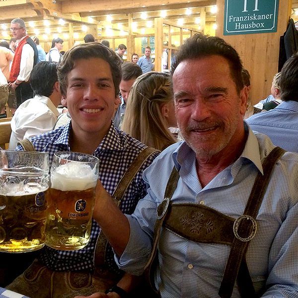Arnold Schwarzenegger And Joseph Baena Travel To Oktoberfest