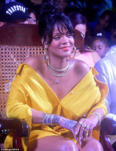 Rihanna in a yellow dress Hellessy Spring attended the ceremony in Barbados