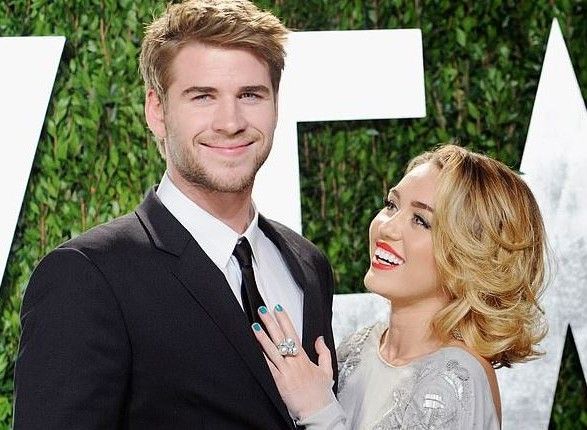 Fireside hugs and kisses: Miley Cyrus officially confirmed the wedding with Liam Hemsworth