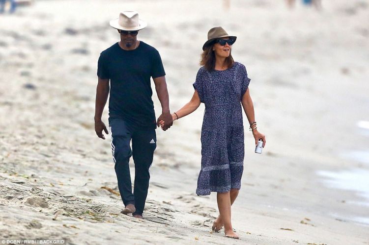 Katie Holmes and Jamie Foxx did not hide feelings at the Grammy party