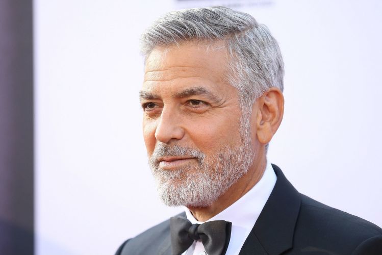 George Clooney turns up behind Meghan Markle