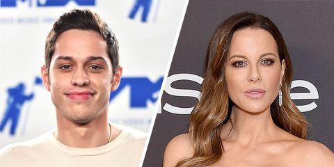 Kate Beckinsale caught kissing with a young lover in a car