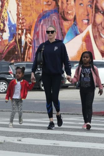 Charlize Theron explains why her son wears dresses