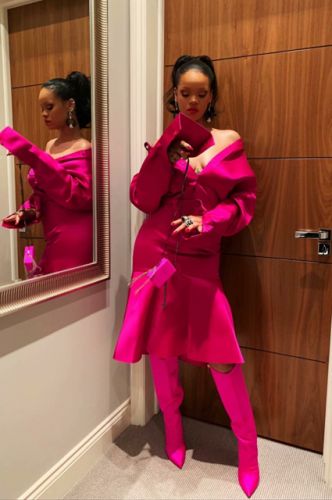 Rihanna tried on a bright dress from her debut luxury collection