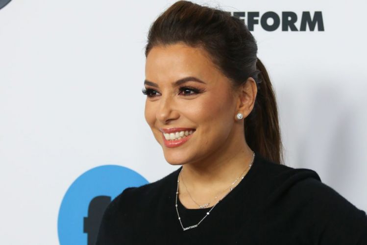 Eva Longoria with her son spotted at Paris airport
