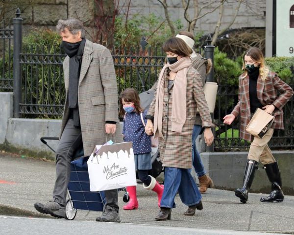 Milla Jovovich with her husband and daughters on a walk-in Vancouver